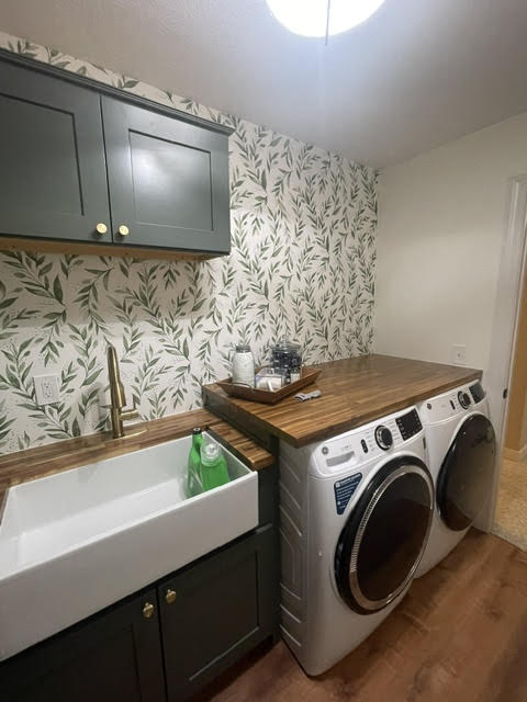 Remodeled laundry room with new cabinets and butcher-block counters